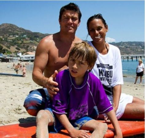 Kim Bordenave and Jimmy Gamboa and Kim's son at the beach.